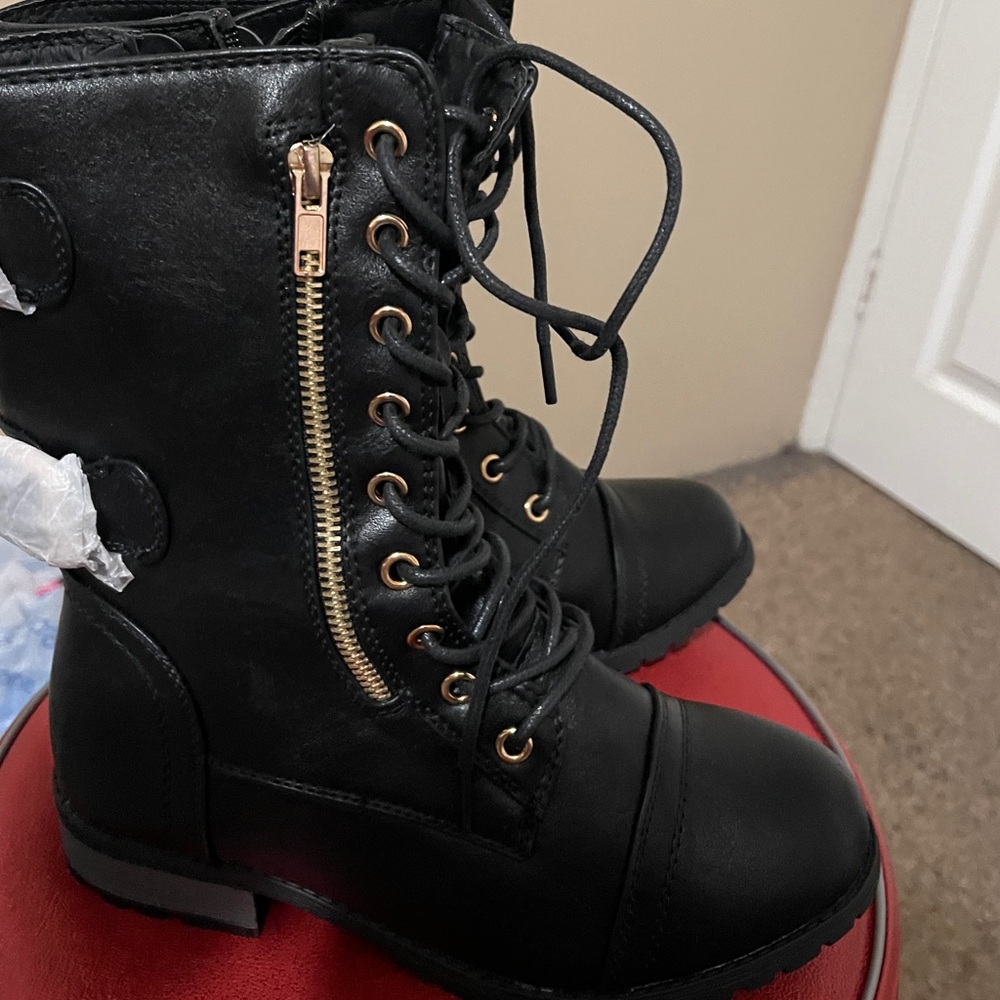 Black lace-up combat boots #combatboots